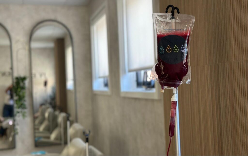 Close up of blood being treated with ozone inside iv bag.