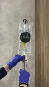 IV Elements nurse prepping chelation therapy.