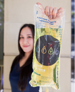 women holding IV Bag